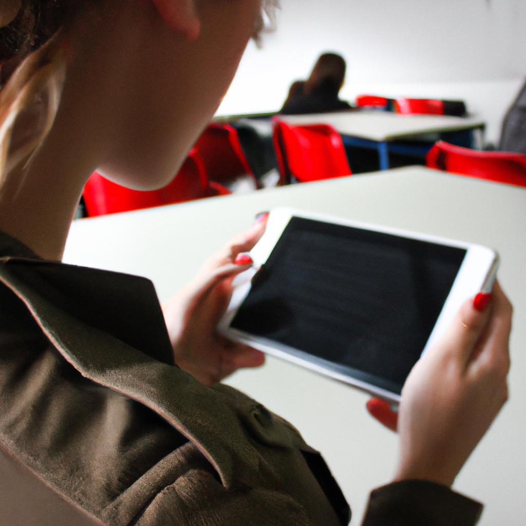 Woman using tablet in classroom
